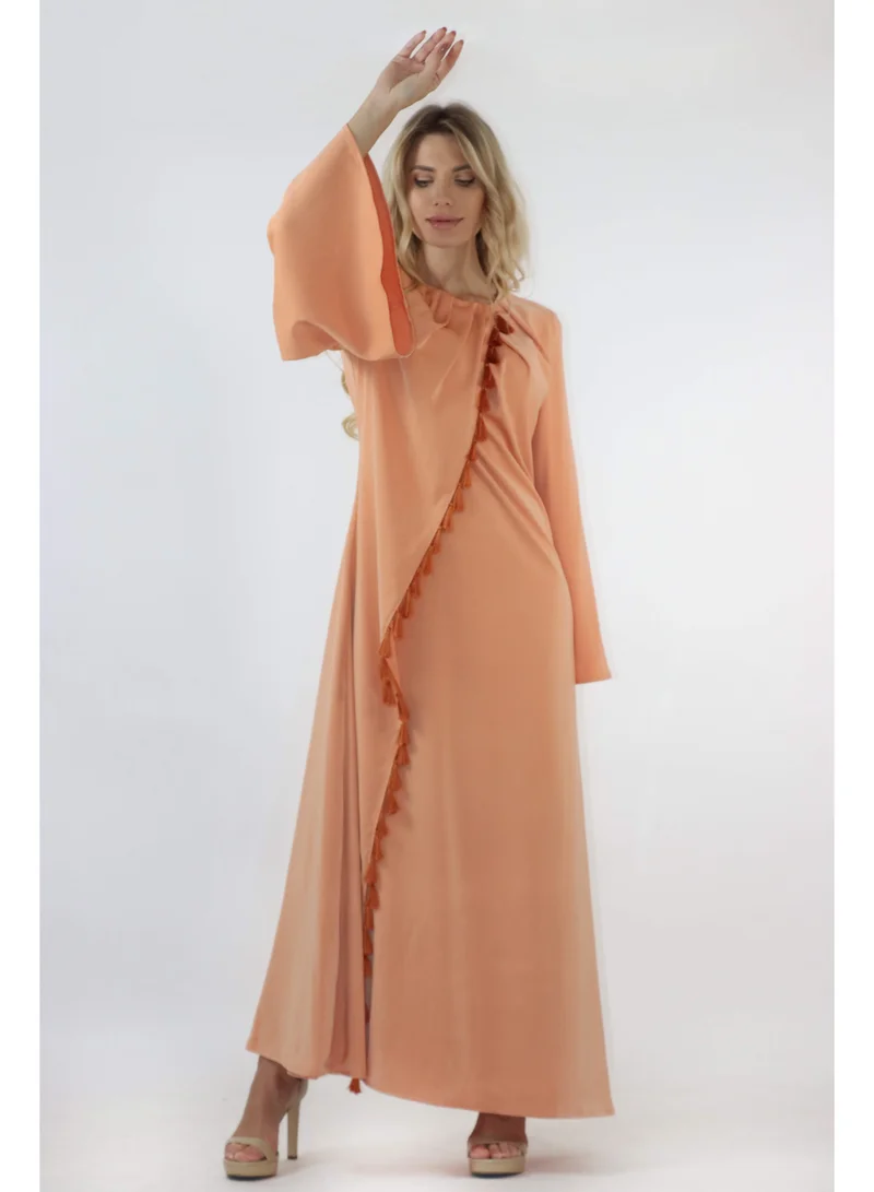 توترندس جلابية أورانج بتفاصيل أكمام واسعة